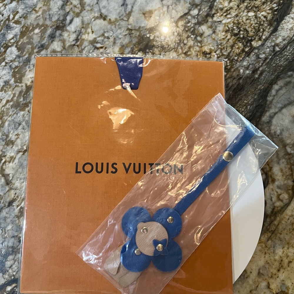 Louis Vuitton Blue Flower Bag Charm and Gift Bag. NWOT!!!